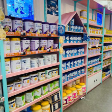 爆款母婴店货架 羊奶驼奶奶粉货架 粉色系孕婴店可调节层高展示架