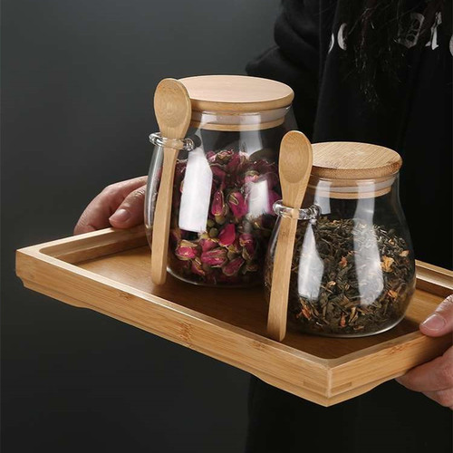 Manufacturer wholesale transparent glass snack storage jar with wooden lid glass big belly cereal sealed jar with spoon tea jar