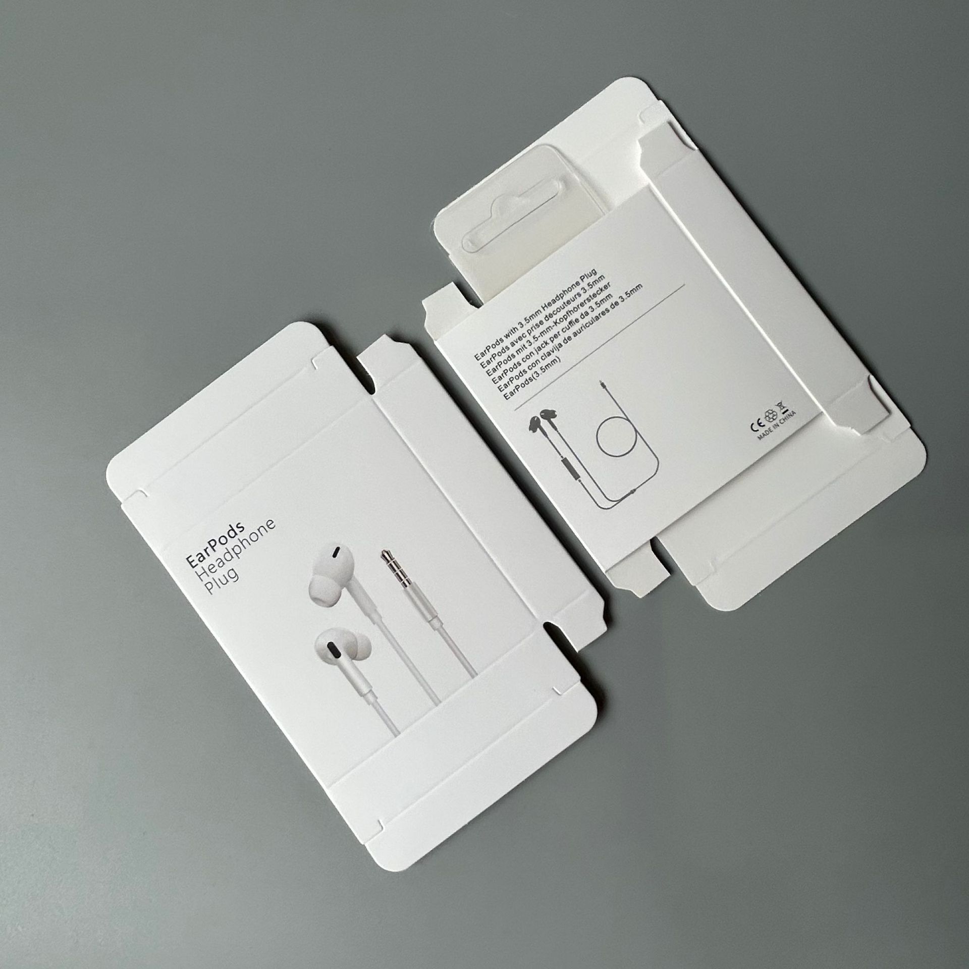Caja de embalaje de auriculares Caja de auriculares con cable en la oreja Caja exterior de auriculares de Apple Caja de papel de auriculares para teléfono móvil al por mayor image 18