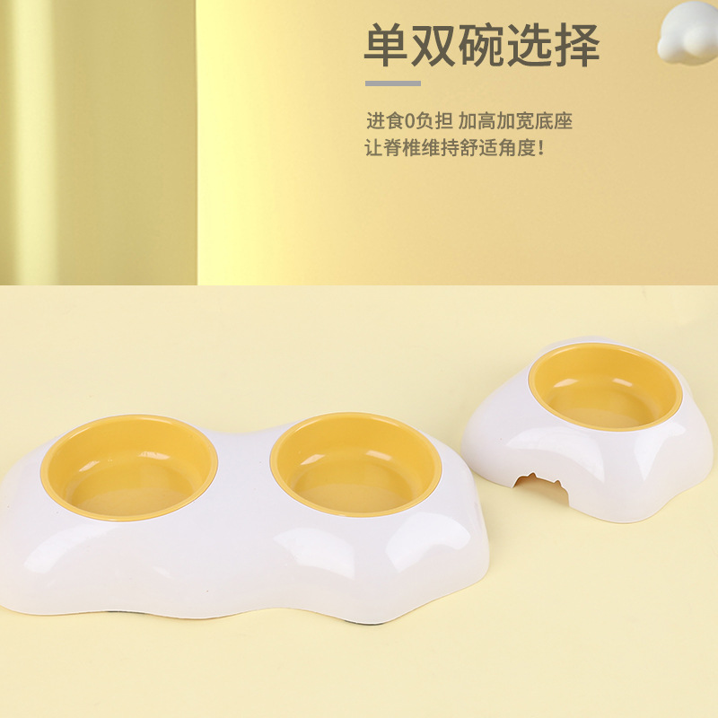 Fabricante en stock nuevo huevo amarillo solo y doble Pet Bowl doble capa antidetonante gato tazón de fuente de alimentación de agua potable cuenca perro tazón
