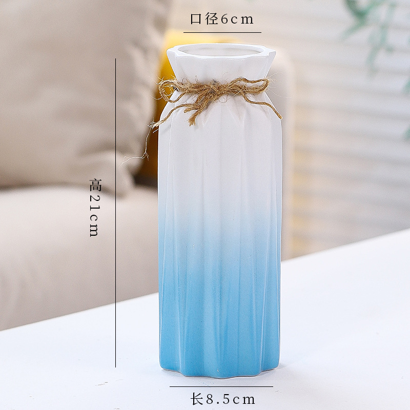 シンプルな現代の満天星陶磁器の花瓶の置物の客間の白い磁器の小さい清新な乾いた花の生け花の創意の陶磁器の花器|undefined