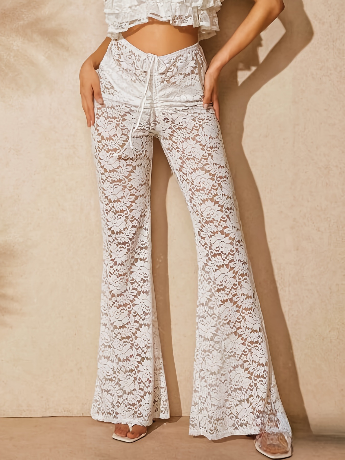 Calças flare em renda transparente cintura alta estilo boho chic_voghion.com