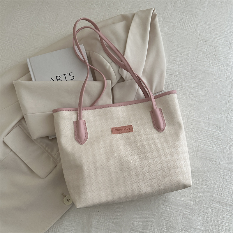Bolso de mano de viaje al trabajo 2024 primavera nuevo bolso de ocio universal bolso de hombro brazo bolso de mano coreano