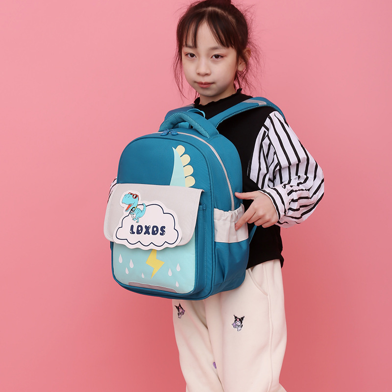 Fábrica al por mayor de los niños mochila simple transpirable de gran capacidad impermeable dinosaurio schoolbag kindergarten mochila de estudiante de la escuela primaria