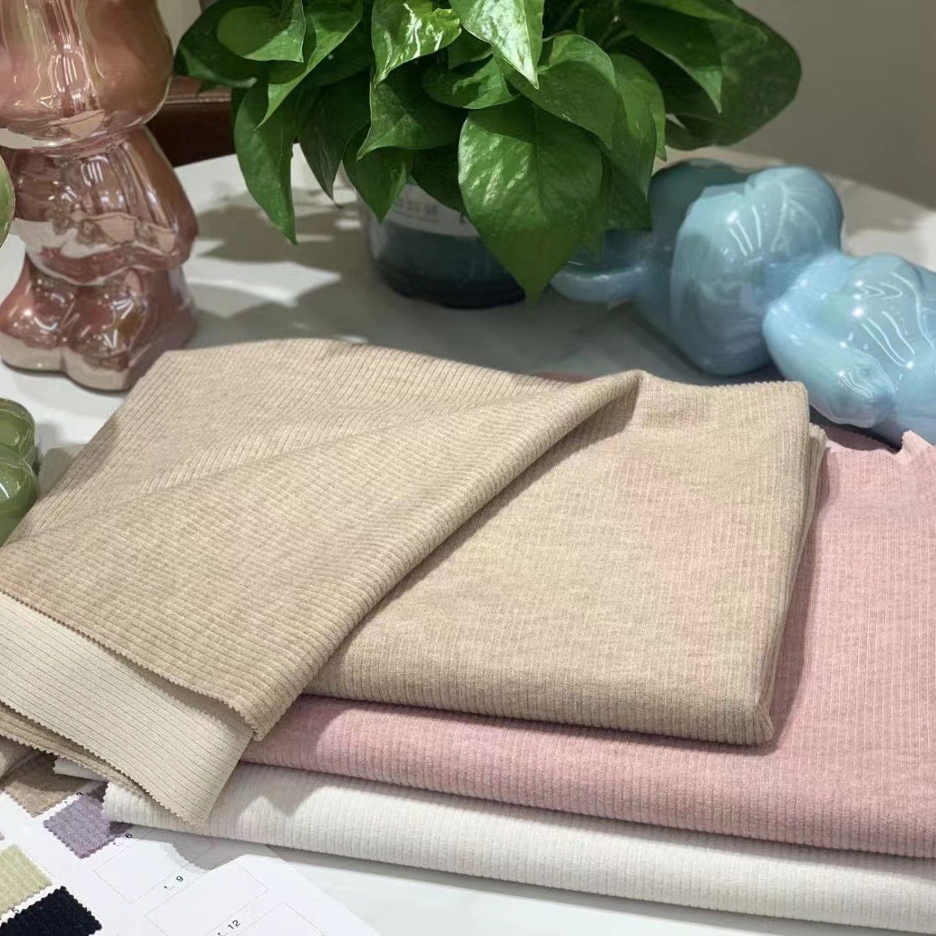 秋冬针织面料仿羊绒面料布慕斯羊绒羊绒系列毛衣阔腿裤童装布料