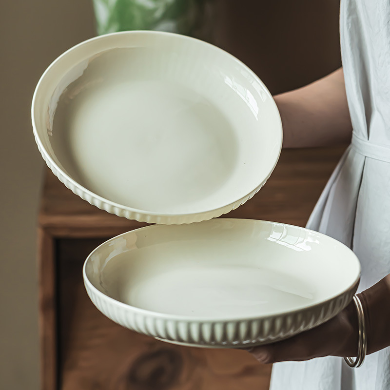 Plato en relieve lleno de sentido del diseño, plato de postre de estilo retro, plato de carne occidental sencillo para el hogar, plato de arroz, vajilla