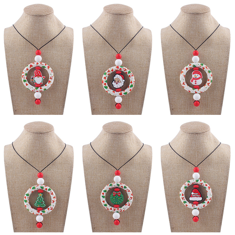 Bebé de dibujos animados de Navidad collar bebé creativo de silicona Santa Claus mordedura COLLAR COLGANTE hecho a mano