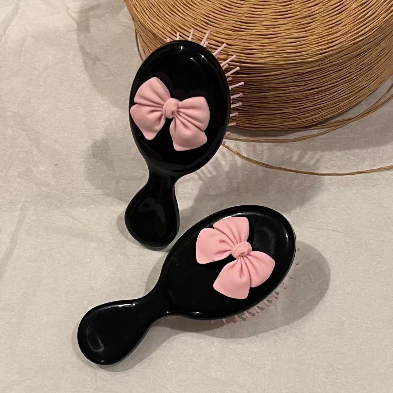 Cepillo portátil con lazo de dibujos animados, peine de masaje con cojín de aire, mini cepillo lindo para niñas