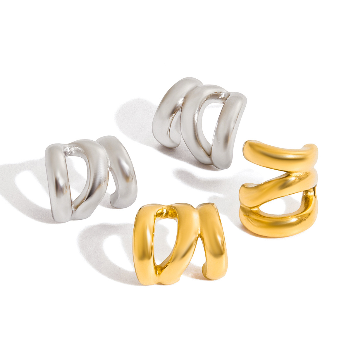 Jieding Cross-border oro 14K acero inoxidable tres capas aretes huecos de lujo ligero pendientes de alta gama joyería de acero de titanio europeo y americano mujeres