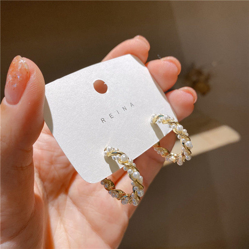 Korean style Dongdaemun temperament pearl earrings S925 silver needle ladylike temperament fashion small fresh spiral round earrings