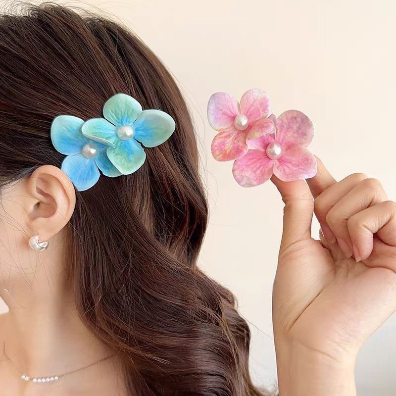 Orquídea de mariposa flores de perlas clip de pelo de vacaciones mar de viento lateral clip de boca de pato super inmortal flores simuladas adornamientos de pelo al por mayor image 3