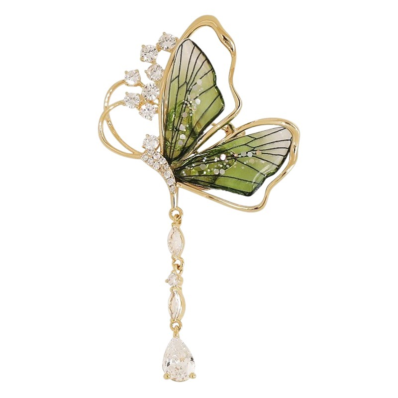 Mago de Oz broche de esmeralda de alta calidad insecto translúcido borla mariposa ramillete cheongsam placket personalidad femenina
