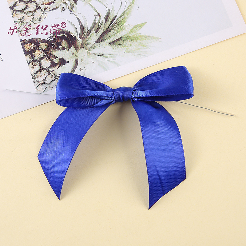 9cmのシルクの蝶結びの現物は国境を越えてよく売れています。50pcs t字の贈り物の包装の25mmのリボンの蝶結びです。|undefined