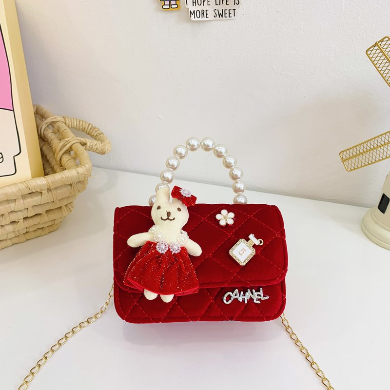 Bolso de niños nuevo bolso de perla rojo de Año Nuevo lindos princesas niñas bolso de hombro de cadena de estilo extranjero bolso de mochila