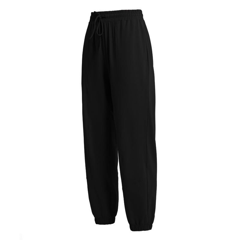Pantalones deportivos europeos y americanos pantalones largos de protección solar para mujeres con cordón para adelgazar polainas sueltas Otoño e Invierno nuevos deportes más pantalones de Yoga de tamaño