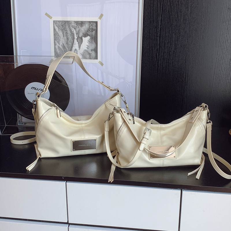 Transfronterizos suaves retro bolsas de brazo portátiles mujeres otoño y invierno 2025 nueva moda versátil bolsas de hombro bolsas de transporte