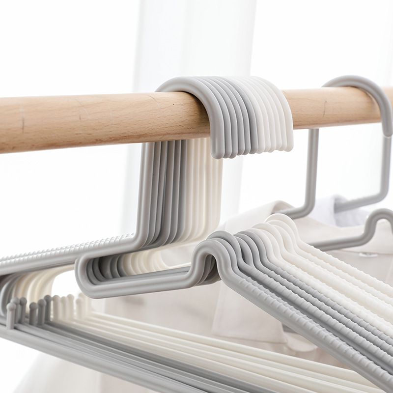 Fábrica sin costuras percha ropa para el hogar soporte grueso antideslizante plástico adulto ropa sólida percha de ropa al por mayor