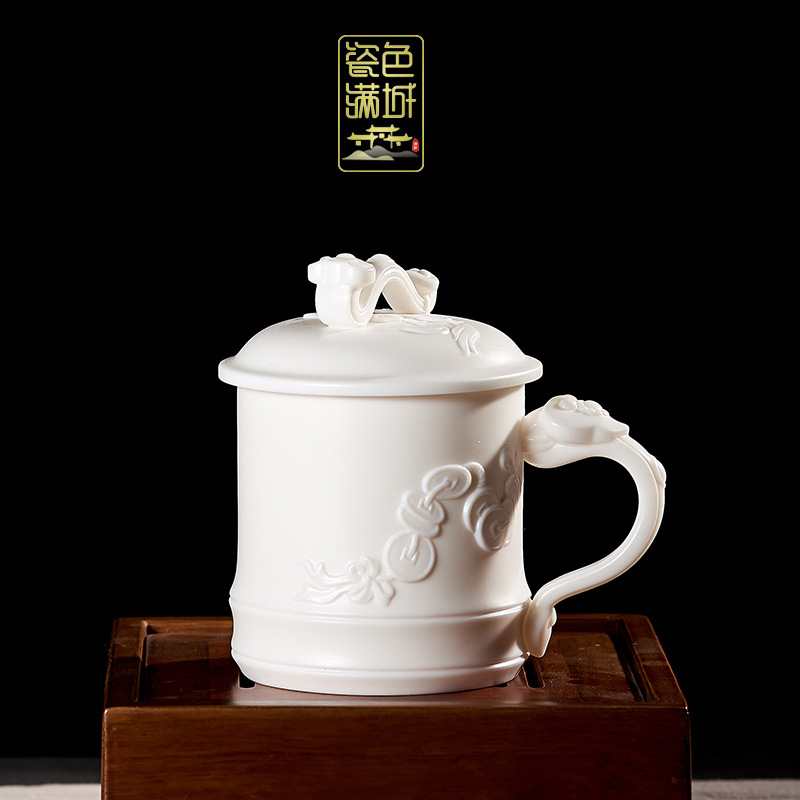 Porcelana color Mancheng Dehua porcelana blanca con tapa filtro oficina con revestimiento de separación taza de agua taza de té grande de cerámica personal