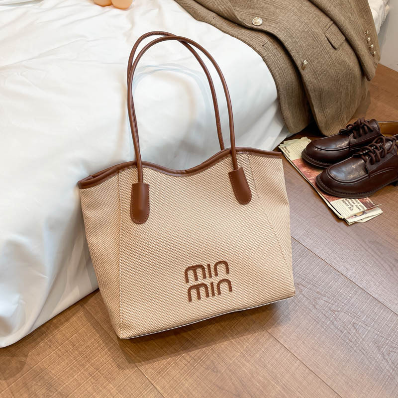 Nuevo tipo transfronterizo de gran capacidad de moda retro versátil de alto valor de la cara bolsas de hombro bolsas especiales para estudiantes universitarios