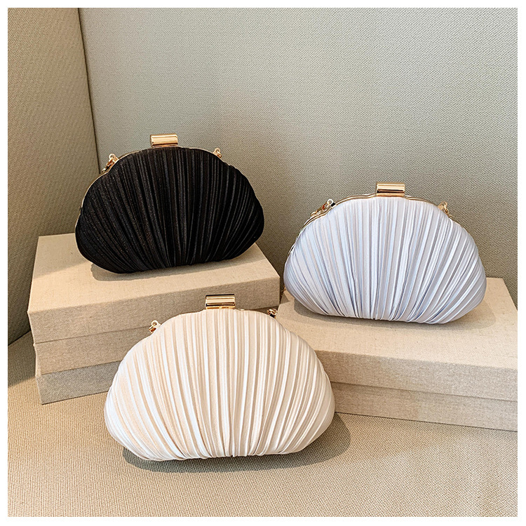 2025 nuevo cross-border Shell damas bolsa de cena ligera de lujo bolsas de mano plegadas de alto nivel sensación de fiesta de boda bolsa de noche