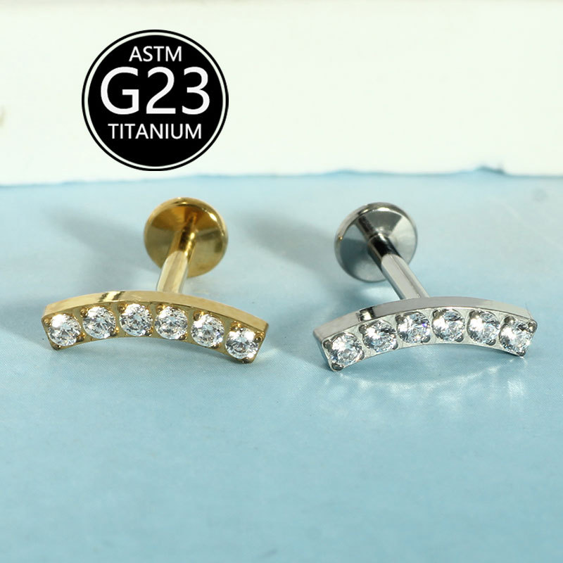 Silver pointed spike labret stud material detail
