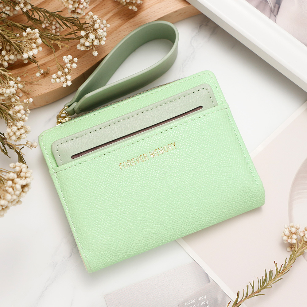 Nueva billetera corta de mujer fresca y simple doble cremallera bolso de cambio multi-tarjeta bolso multifuncional