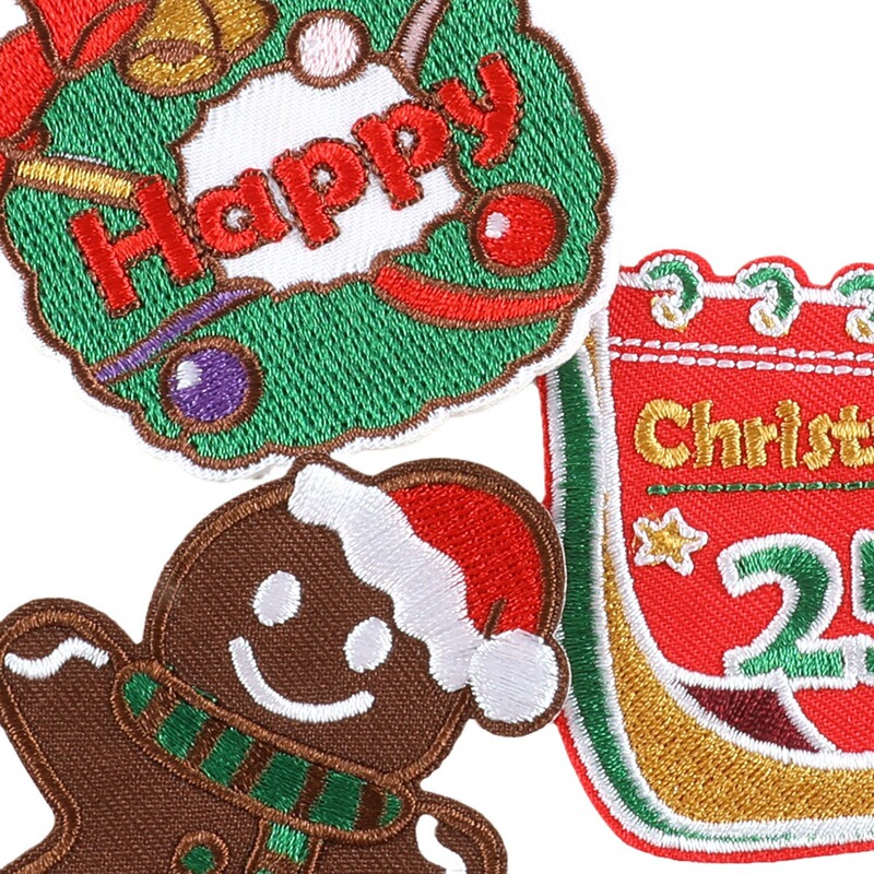 つのクールなオリジナルの刺繍の服の付属品の刺繍はクリスマスシリーズの漫画のパッチのバッジの布を貼って雪だるまの布を貼って貼ります。|undefined
