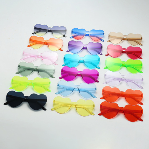 New cross-border heart-shaped sunglasses love glasses European and American trend frameless one-piece ocean film dazzling color sunglasses