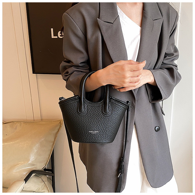 Hand held bucket for women 2024 new Korean version Instaram trendy fashion versatile shoulder simple niche crossbody_voghion.com