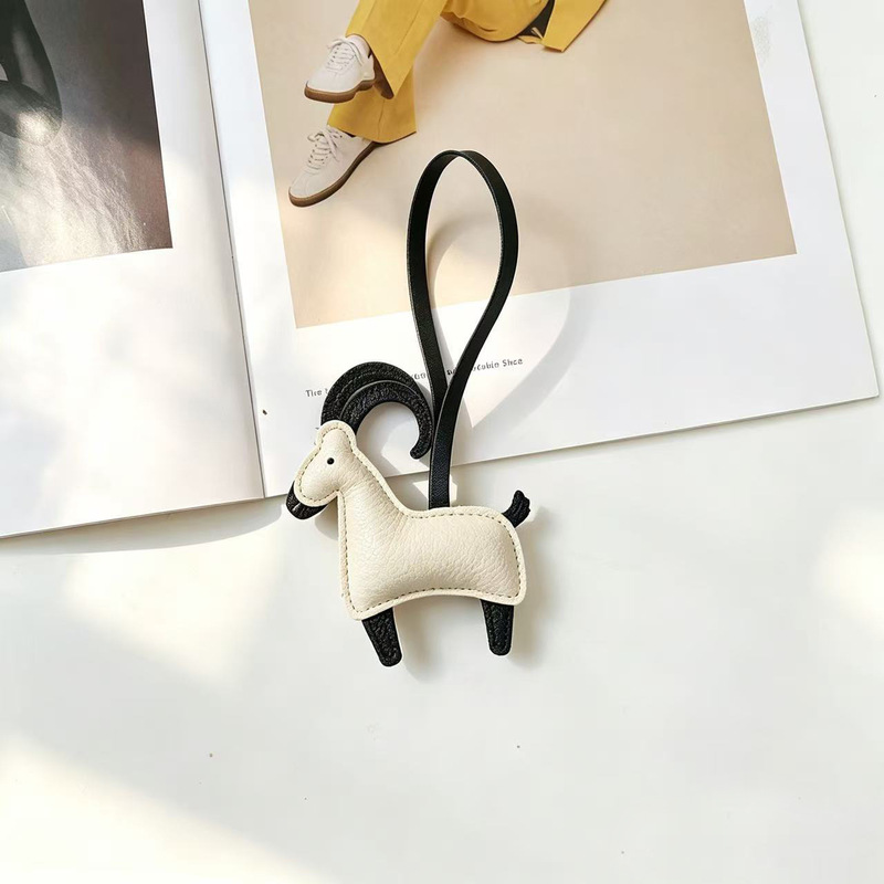 Vintage-style leather goat and antelope pendant, high-end lambskin bag accessory, handmade leather keychain accessory