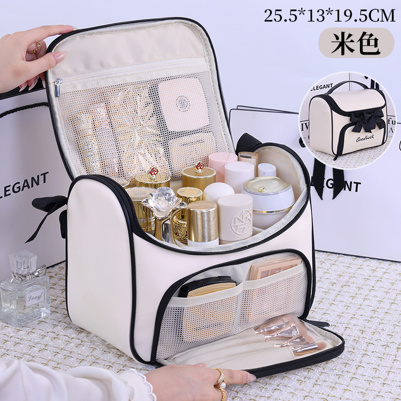 Luz lujosa pequeña fragancia arco bolsa de maquillaje mujer gran capacidad de viaje portátil división impermeable bolsa de almacenamiento de lavado de alto nivel