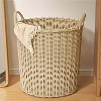 Laundry basket, storage basket, storage system, doll