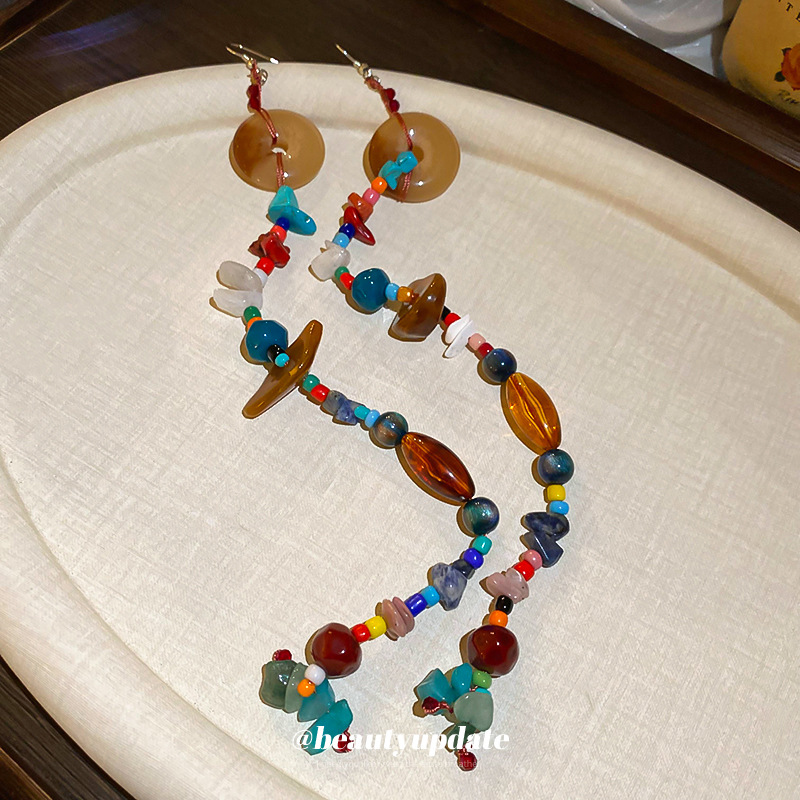 Pendientes de cuentas de resina de color irregular de estilo étnico Pendientes de borla ultralargos Pendientes frescos pequeños retro al por mayor