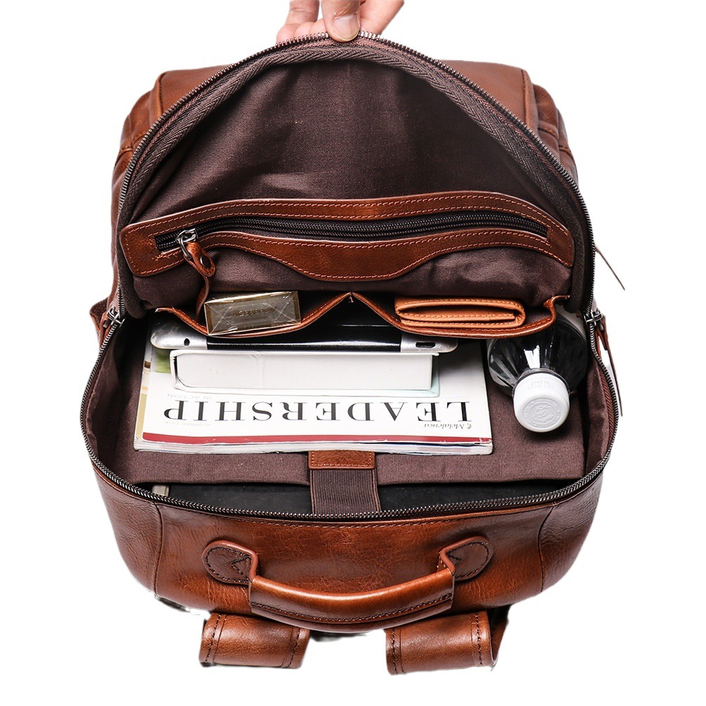 Jiagong ventas directas de la fábrica mochila de los hombres primera capa de piel de vaca de gran capacidad Mochila De Cuero curtido vegetal bolsa de viaje de Europa y América Retro