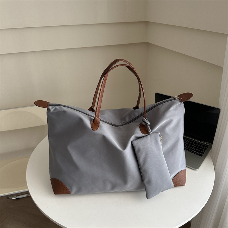 Bolsa de viaje para mujeres 2024 nueva sensación de alto nivel bolsas de bolsas de viajes portátiles bolsas de bolsas de moda de hombro de gran capacidad para mamá