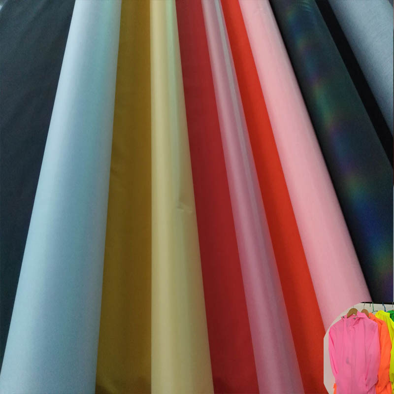 彩色化纤春亚纺反光布料柔软服装休闲外套反光面料粉红色反光材料