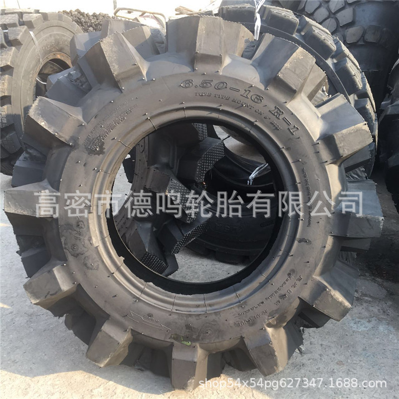 Suministro de campo de arroz agrícola de alta flor neumático 650/750-16 tractor neumático 8,3/9.5-20/24