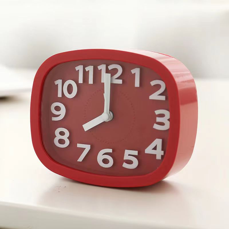 Fábrica al por mayor personalizada estudiante reloj de los niños mesita de noche reloj de cuarzo mudo escritorio pequeños adornos reloj despertador reloj electrónico