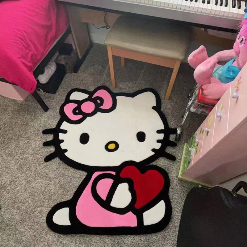 옆으로 앉아있는 핑크 러브 kt 고양이