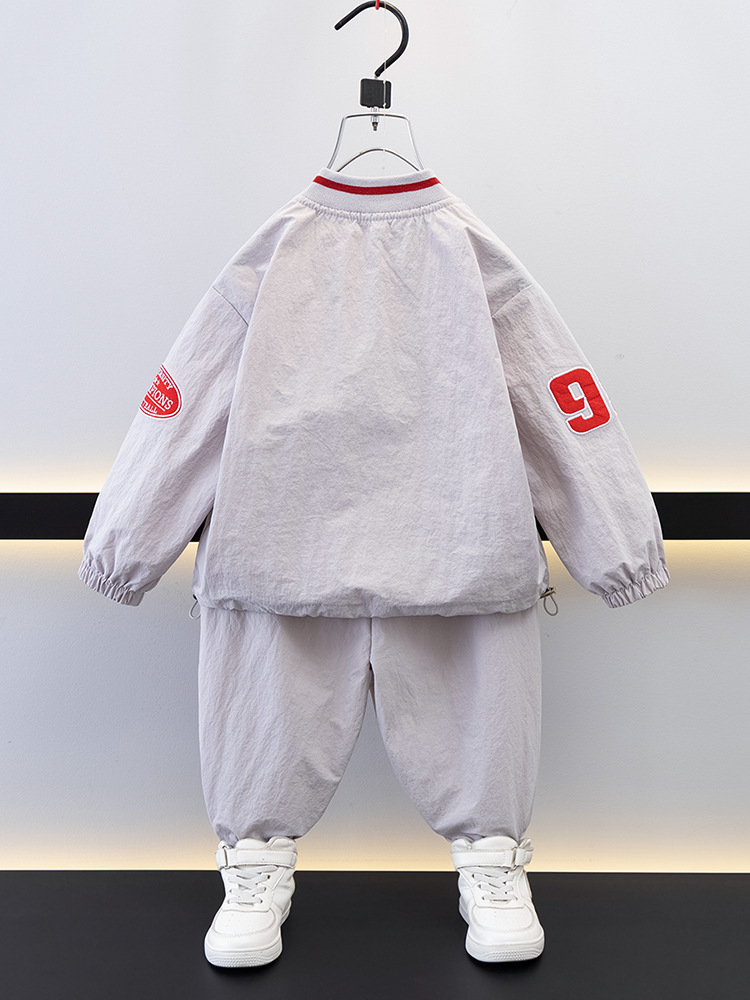 7693 Traje de ocio de herramientas para niños 2025 Primavera Nuevo estilo para niños pequeños y medianos Top de letras para bebés Pantalones de dos piezas