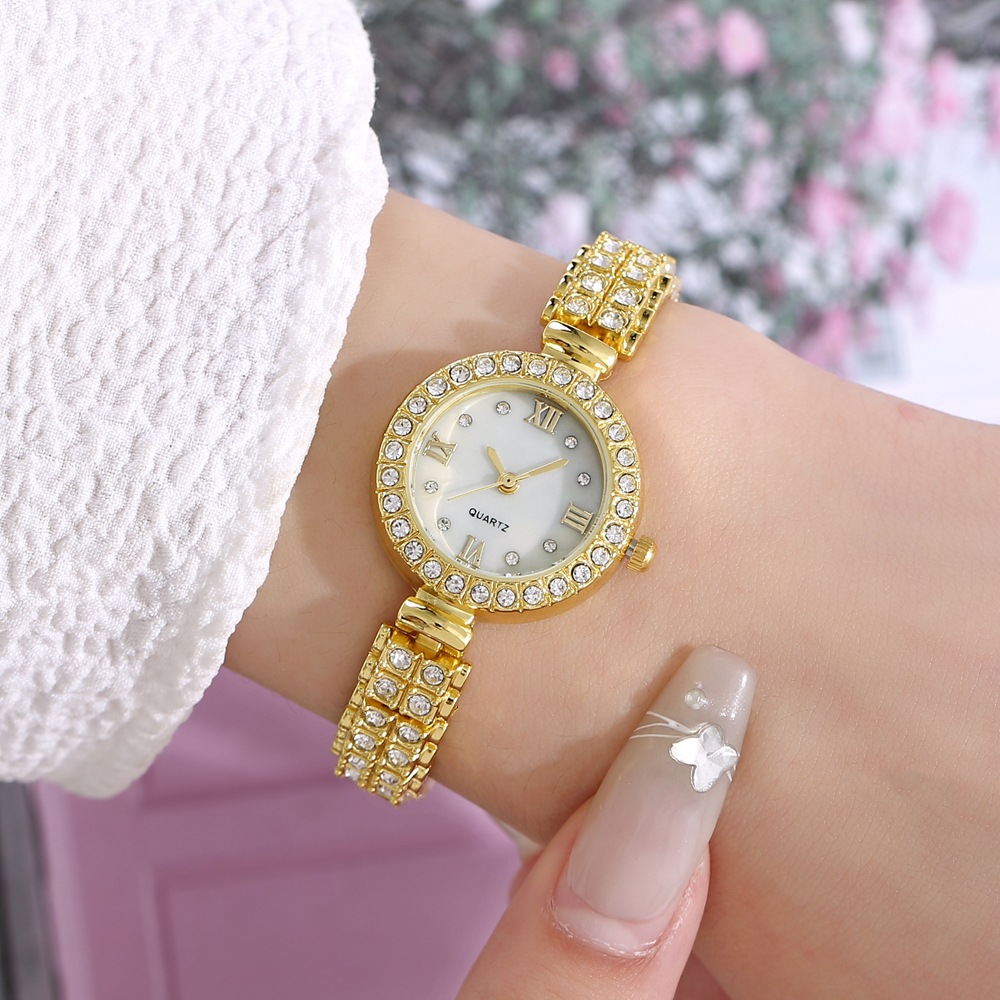Nueva moda pequeño dial de diamante correa de acero de diamante reloj de mujer