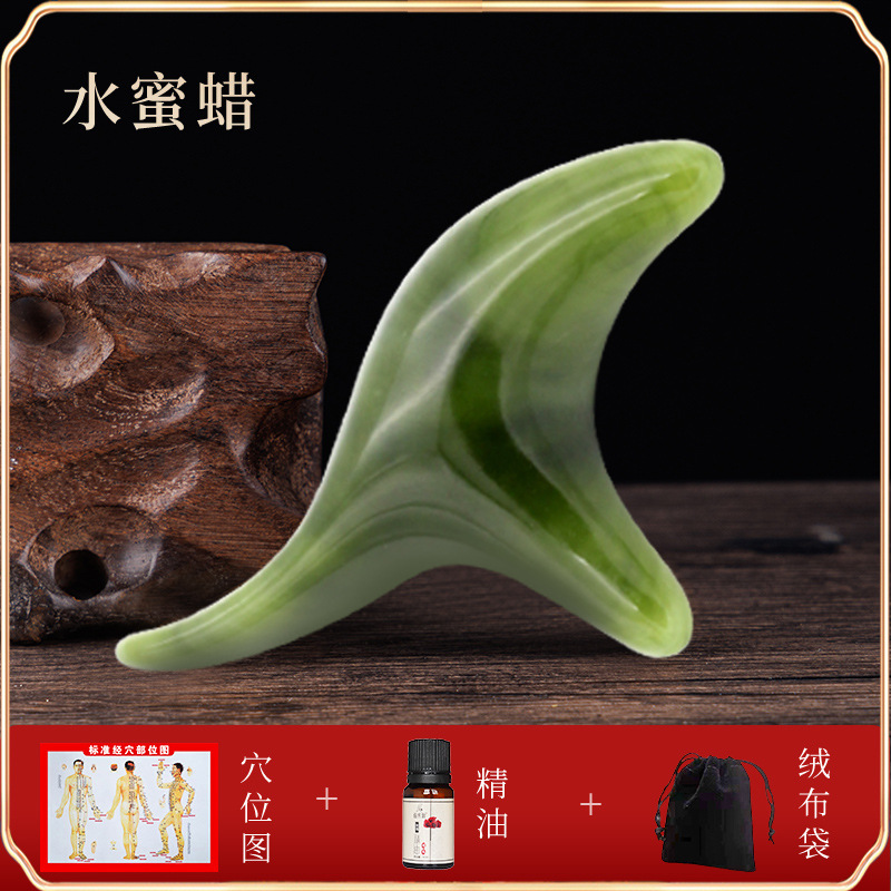 檀木の三角すずめのマッサージ器の蜜ろうの香木の筋の経絡の錐は足の底のツボの足を押してマッサージして穴の棒をつけます。