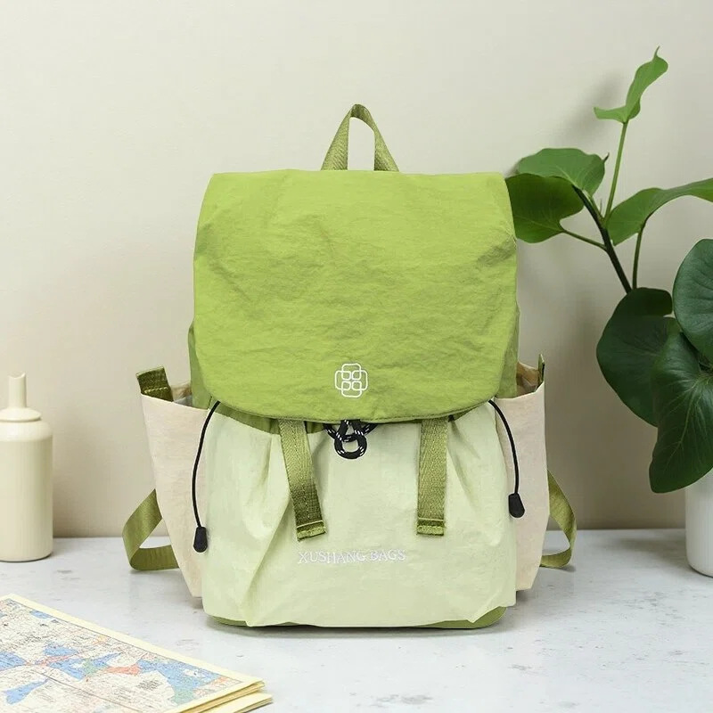Mochila para mujeres, mochila de color ligera coreana, nicho de viaje al aire libre, mochila de montaña.