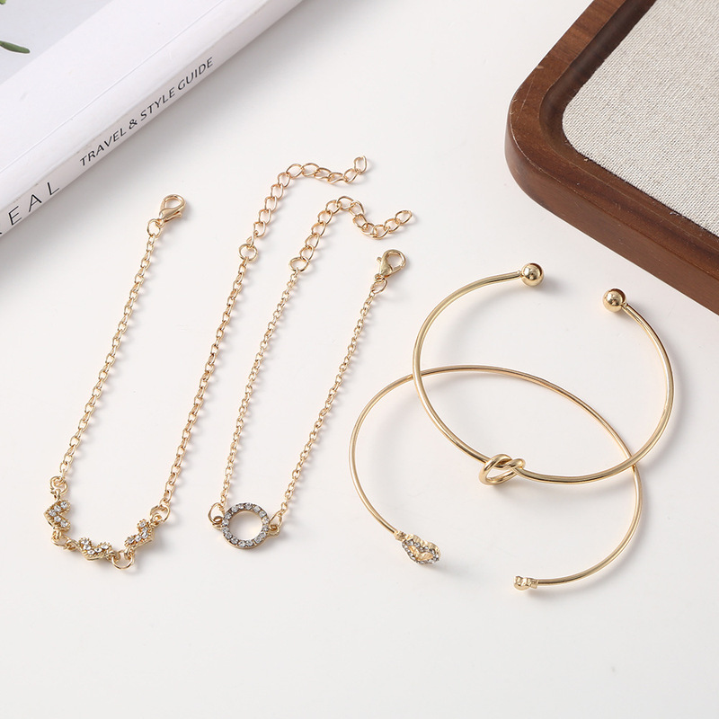 New European and American style alloy heart-knot bracelet, niche design knotted open bangle 4-piece set wholesale New European and American style alloy heart-knot bracelet, niche design knotted open bangle 4-piece set wholesale