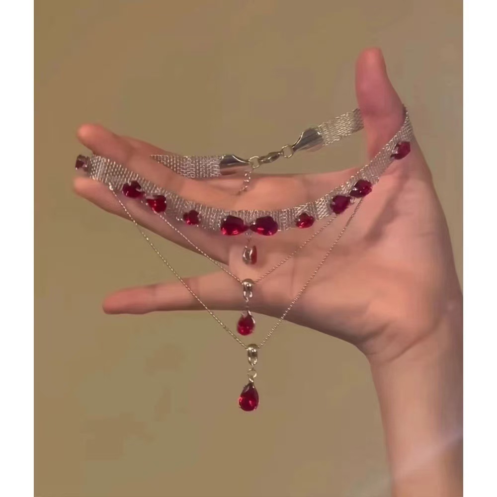 Red multi-layered tassel necklace