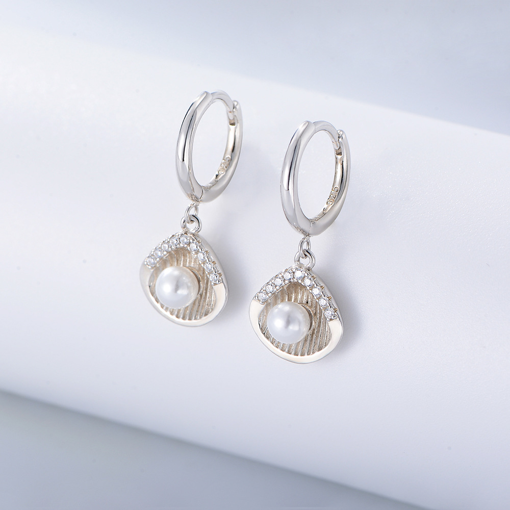 S925 plata esterlina en forma de concha de perlas pendientes de alto grado europeo y americano ins moda personalizada pendientes incrustados de diamantes para las mujeres