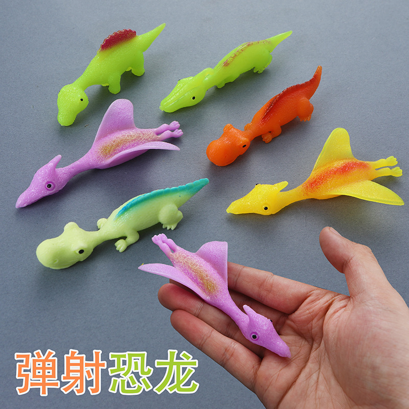 Juguete de descompresión de Catapulta de dedo de dinosaurio creativo TPR Catapulta de dedo de goma suave para niños nuevo juguete exótico
