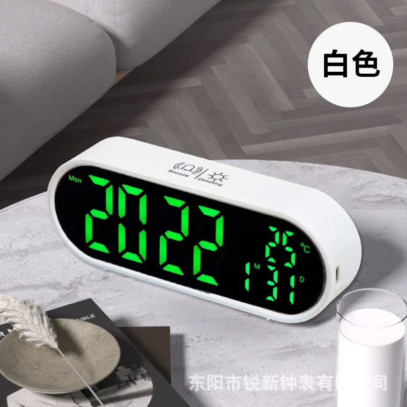 Reloj despertador electrónico ovalado de plástico, venta directa de fábrica, multifuncional, se puede usar como espejo, estilo coreano simple.