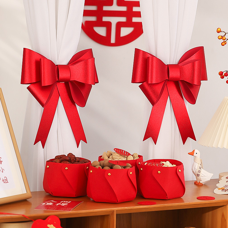 Internet-famous wedding room decor: bow-shaped ornaments for living rooms and bedrooms, tie-up decorations for curtains, and wedding-themed floral string sets with "double happiness" characters.