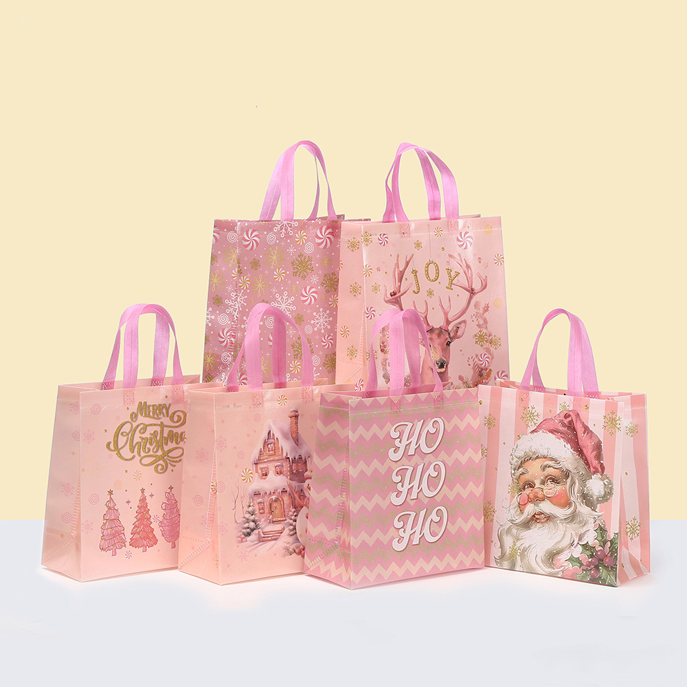 粉色圣诞手提袋无纺布袋包装袋印花礼品袋商场糖果袋防水外卖袋